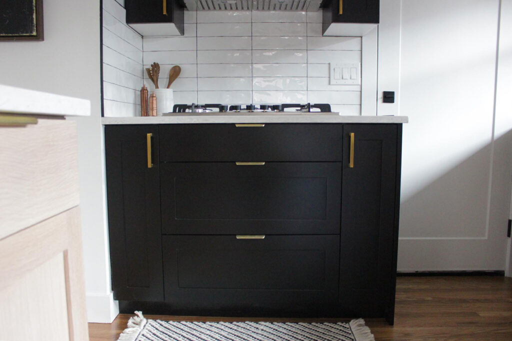 Black wood kitchen stove cabinet