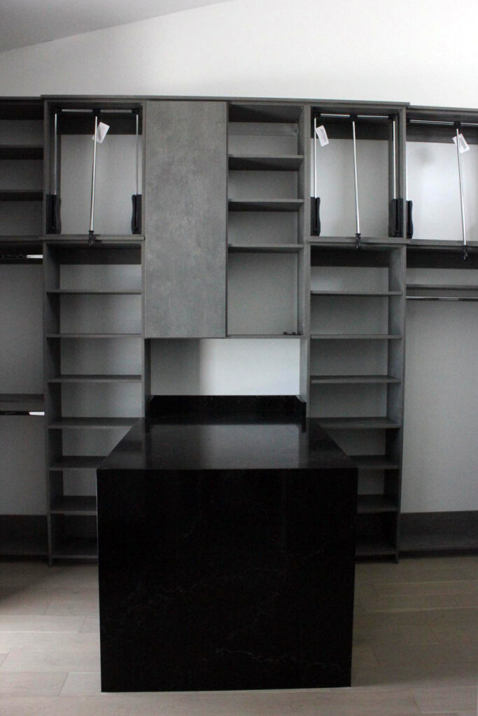 Custom cabinets covering a dresser room