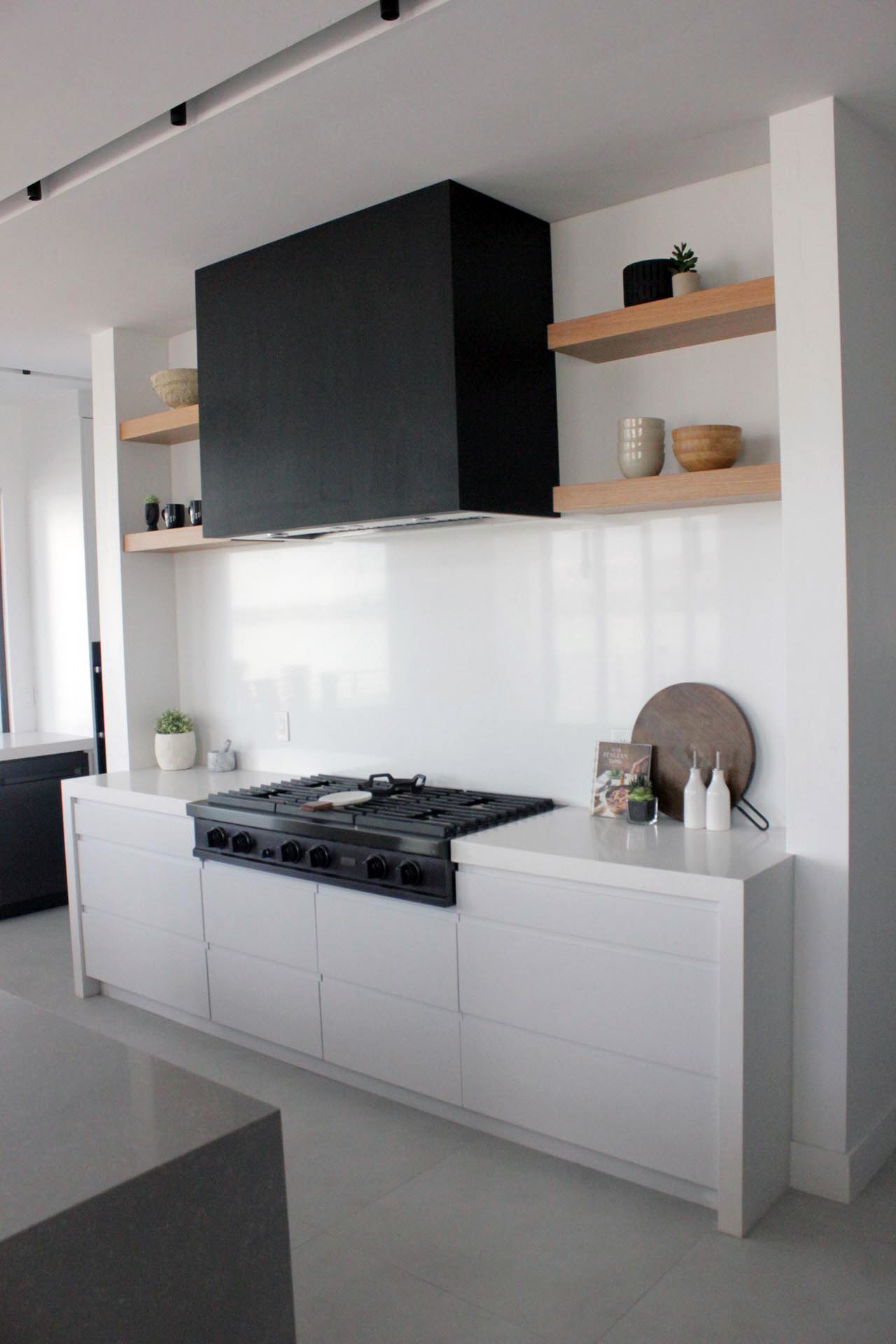 modern high-end black & white kitchen cabinet with wood shelves