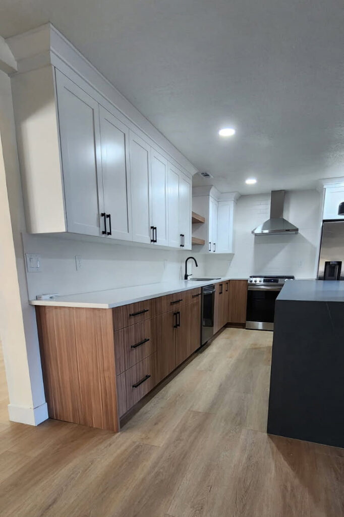 Apartment kitchen design with vargas cabinets in white, wood and charcoal